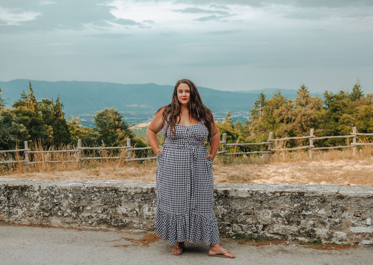 plus size woman traveling in tuscany italy